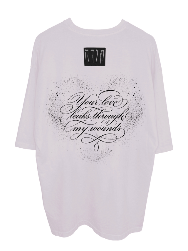 LOVE WOUNDS OVERSIZED T SHIRT