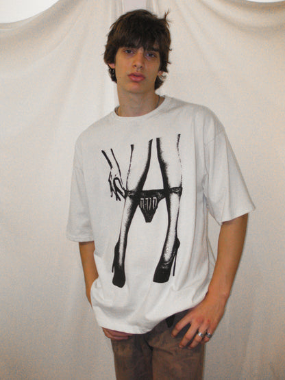 UNDER HER OVERSIZED T-SHIRT